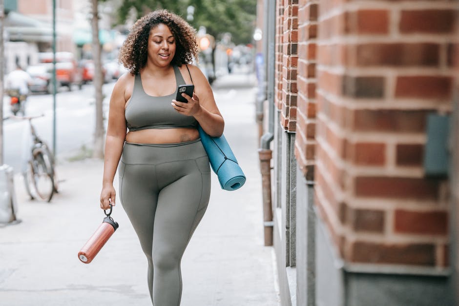 Woman confidently walking in well-fitting, simple outfit