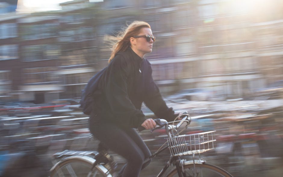 woman cycling city
