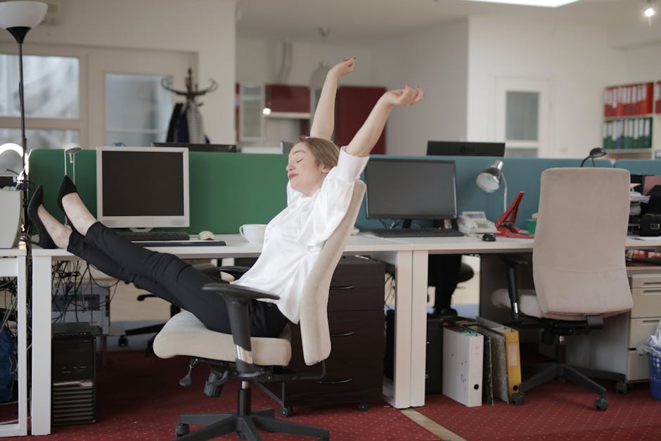 woman doing quick stretches in office