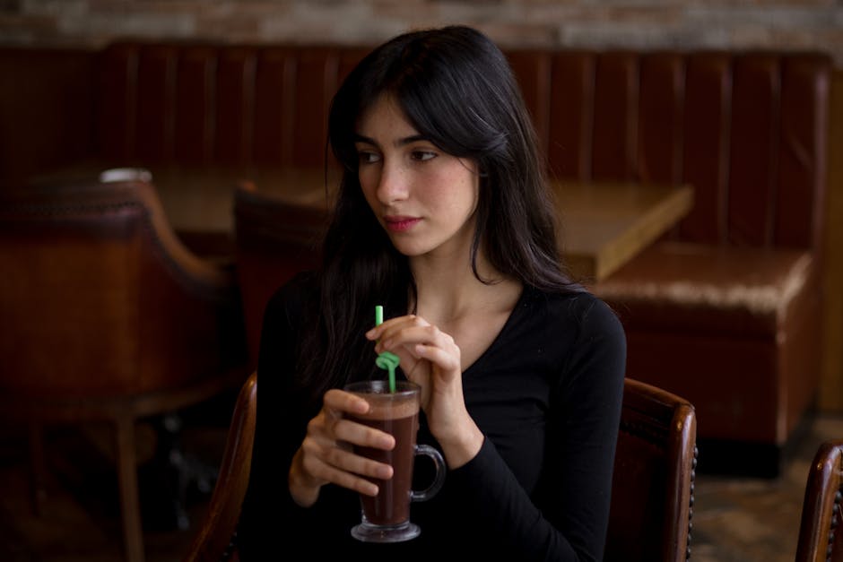 Woman drinking coffee stylish cafe Germany