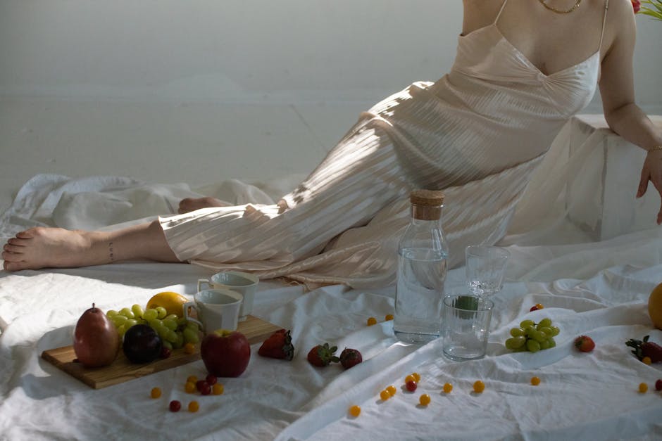 woman drinking water with fruit