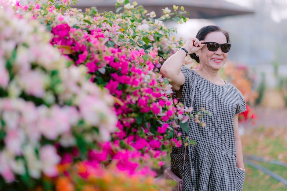 Woman enjoying colorful garden