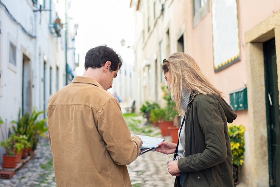 woman looking at map on charming street in France