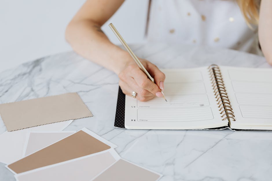 Woman planning tasks in minimalist notebook