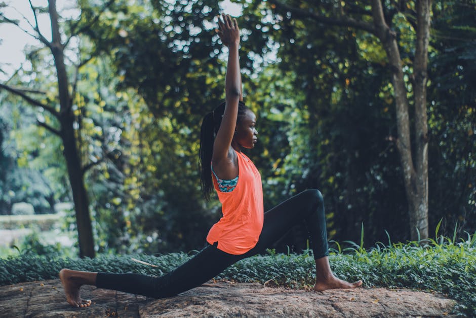 Woman practicing gentle yoga or stretching in a serene outdoor setting
