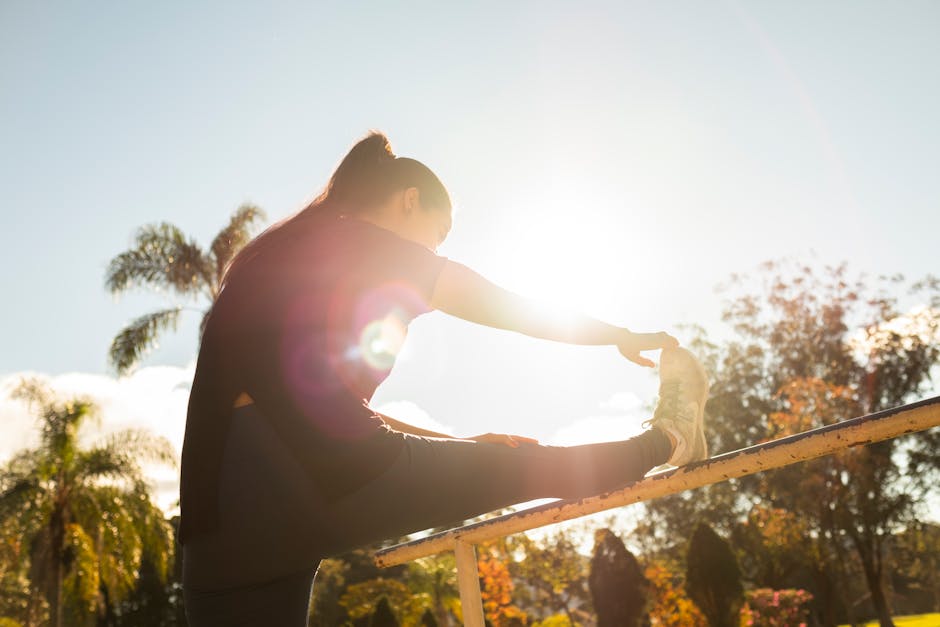 Woman stretching sunlight