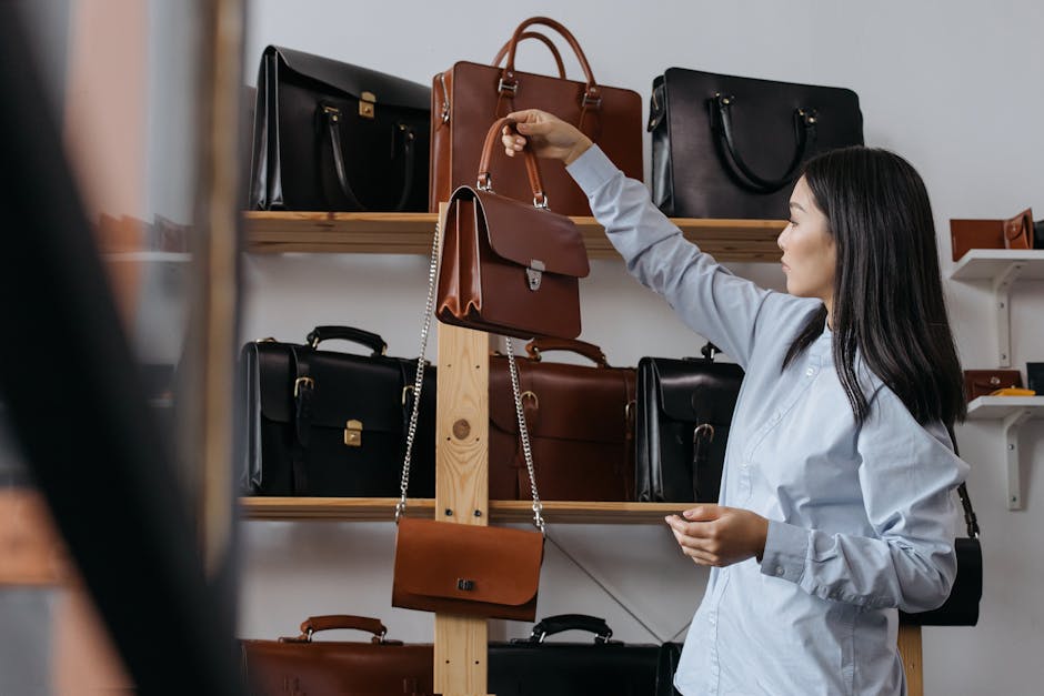 woman trying on quality leather handbag