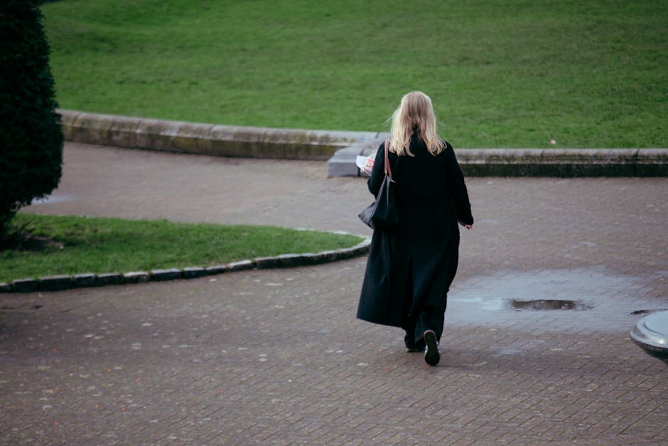 woman walking in city park