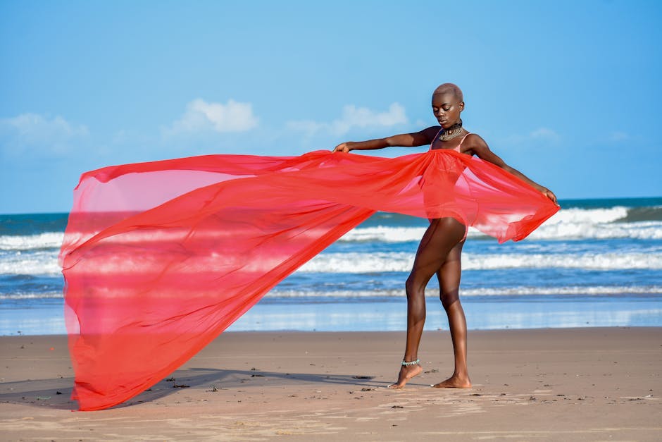 woman walking tropical beach flowing dress