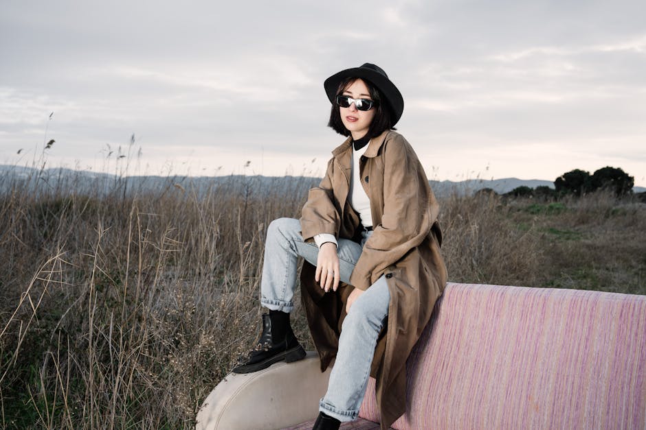 Woman wearing stylish trench coat Spain