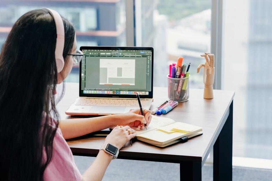 woman working from home with laptop and AI tools