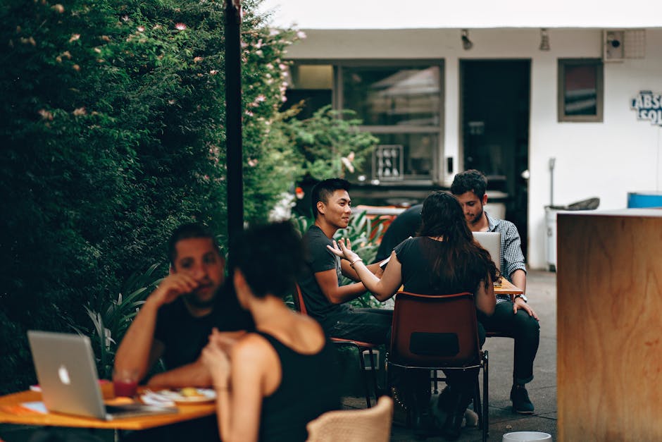 Young Brazilian woman working laptop cafe