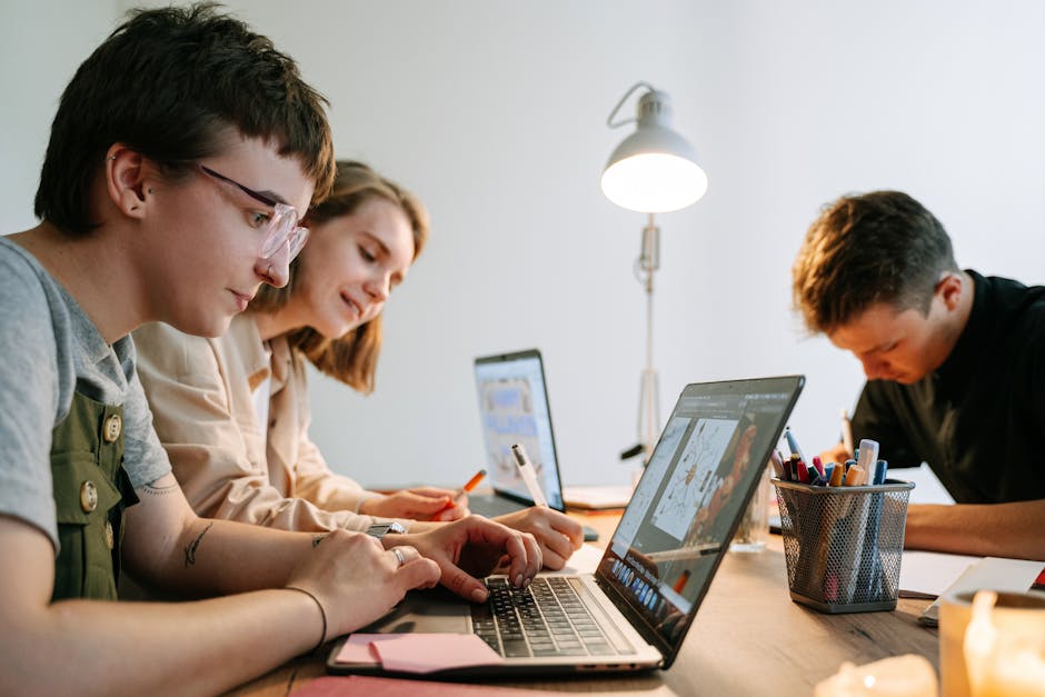 Young Ukrainian AI developers collaborating on a project